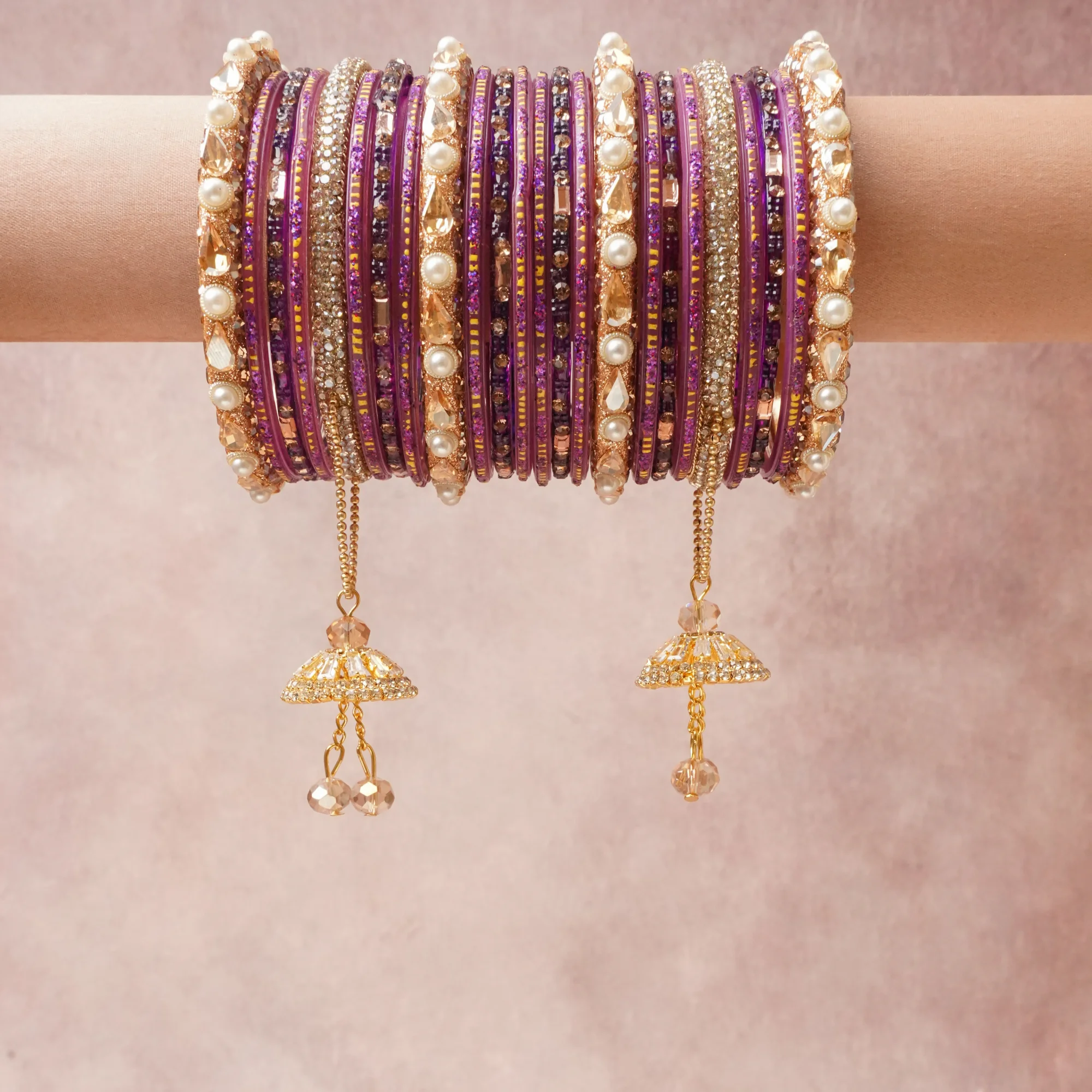 A commanding Amethyst Purple anchors this beautiful set, enriched with accents of Rich Gold, Cream Pearl, Champagne Crystal, Clear Crystal, Smoky Taupe Crystal that add depth and dimension.

Featuring a striking composition of Glass, Gold-Toned Metal, Simulated Pearls, Crystal Rhinestones, Faceted Crystals, Glitter Enamel, this set carries intricate craftsmanship and strong presence. Grand in form, it is created for moments that deserve to be marked.